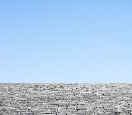 background with cobbled streets and skyの写真素材