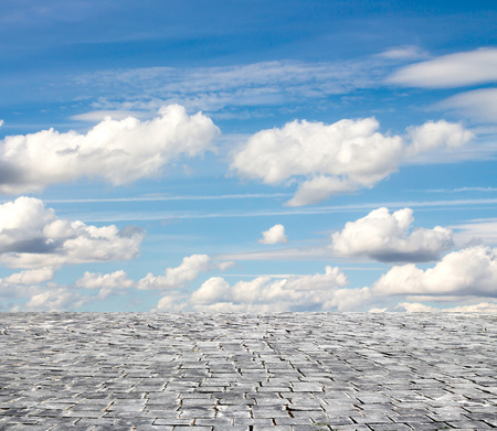 background with cobbled streets and skyの写真素材