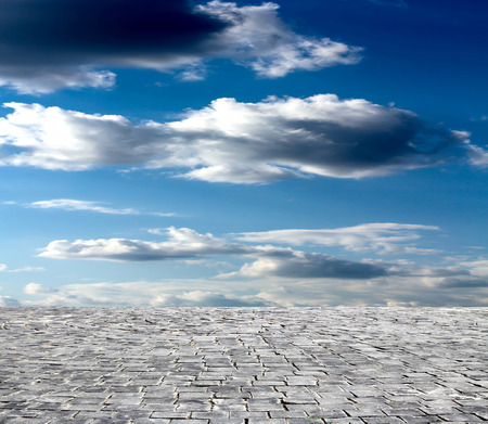 background with cobbled streets and skyの写真素材