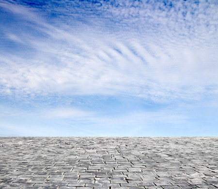 background with cobbled streets and skyの写真素材