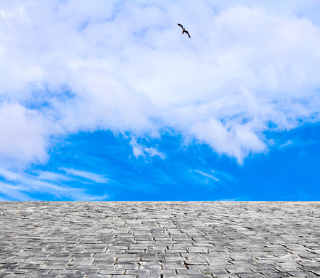 background with cobbled streets and skyの写真素材