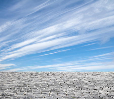 background with cobbled streets and skyの写真素材
