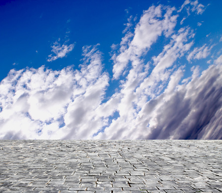 background with cobbled streets and skyの写真素材