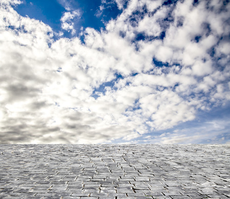 background with cobbled streets and skyの写真素材