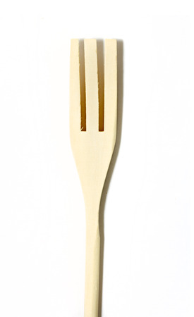 wooden spoons on a white background isolatedの写真素材