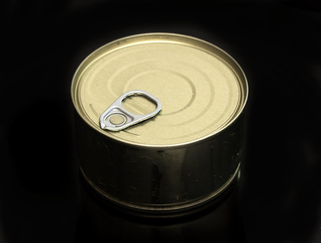 round can canned on a black backgroundの写真素材