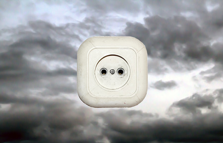 old white socket on a wooden background