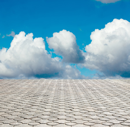 decorative paving stone on a background of blue skyの写真素材