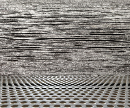 interior metal floor background on wooden wallの写真素材