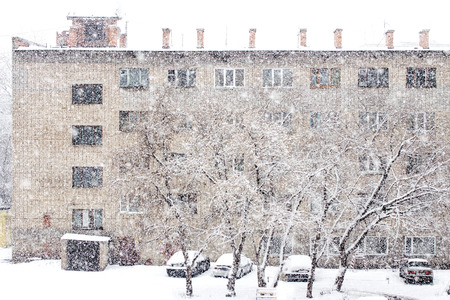 spring snowfall in the cityの写真素材