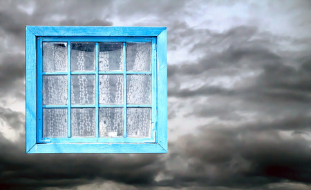 Old window of a wooden house wallの写真素材