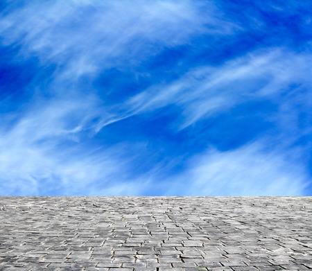 background with cobbled streets and skyの写真素材