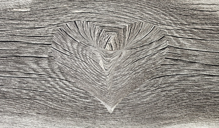 wooden heart on a wooden backgroundの写真素材