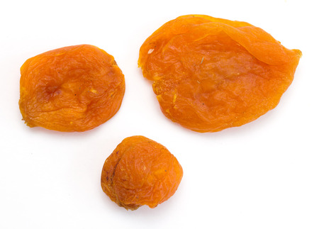 apricots dried  on a white backgroundの写真素材
