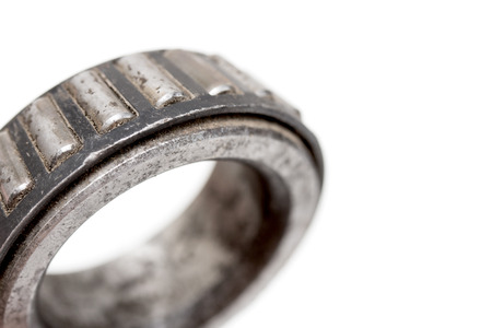old roller bearing with traces rust, isolated on white background.の写真素材