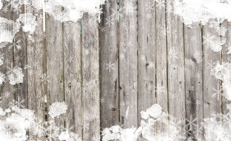 Old wooden background with snow for design. Christmas backgroundの写真素材
