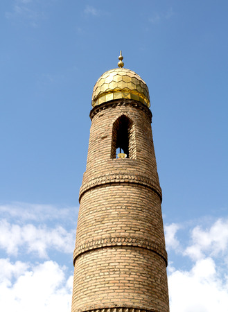 Muslim prayer tower on sky の写真素材
