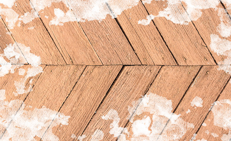 wooden background in snow surfaceの写真素材
