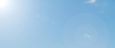 Cloudy sky with bright sunshineの写真素材