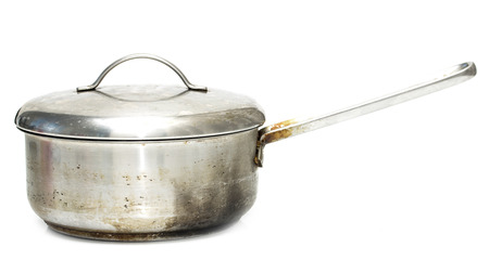 old metal pan on a white backgroundの写真素材