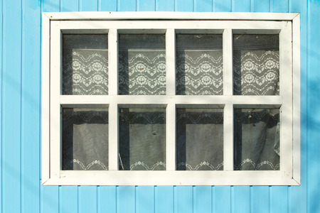 window in the wall of the houseの写真素材