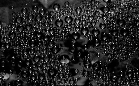 waterdrops bubbles on a dark backgroundの写真素材