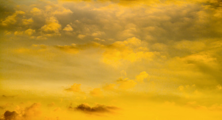 The glow of the sunset, the sky cloudsの写真素材
