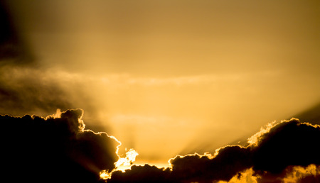 The glow of the sunset, the sky clouds