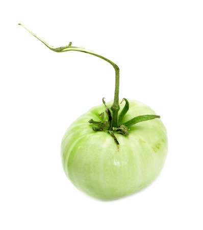 green tomato on white backgroundの写真素材