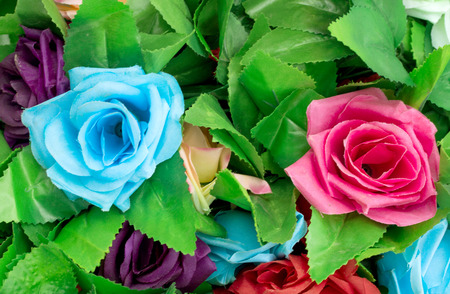 beautiful artificial roses flowers for background.の写真素材