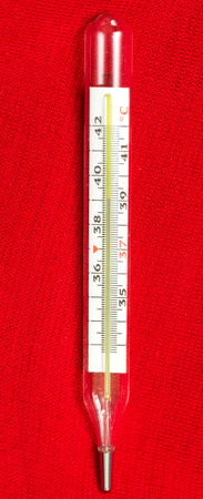 Medical glass mercury thermometer isolated
