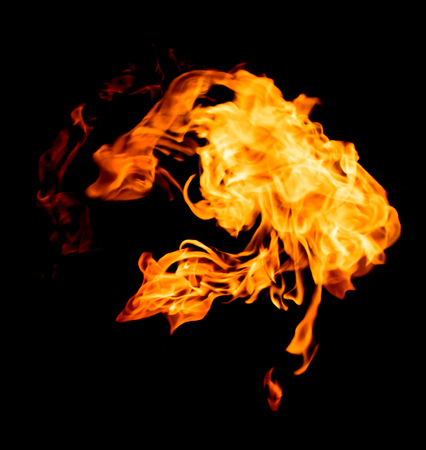 Fire flames on a black backgroundの写真素材