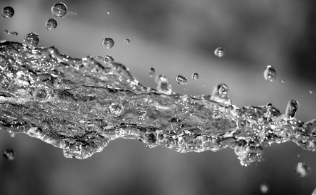 spray water on a dark background