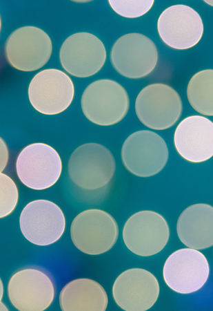 Abstract circular colorful bokeh from the party lightの写真素材