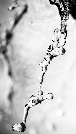 spray water on a dark background