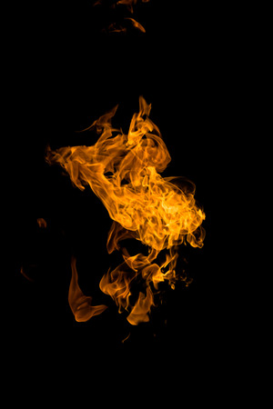 Fire flames on a black backgroundの写真素材