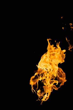 Fire flames on a black backgroundの写真素材