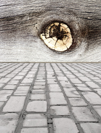 brick floor with a wooden wallの写真素材