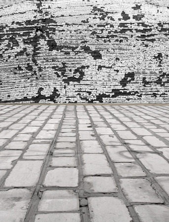 brick floor with a wooden wallの写真素材