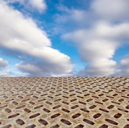 blue sky and metallic floor, industrial backgroundの写真素材