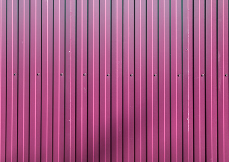 brightly colored new metal fence, backgroundの写真素材
