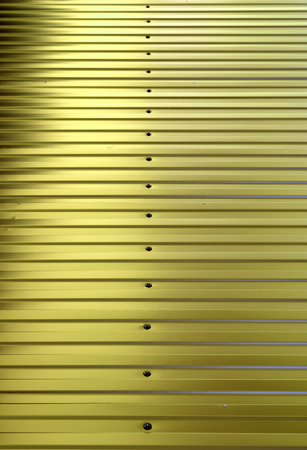 brightly colored new metal fence, backgroundの写真素材