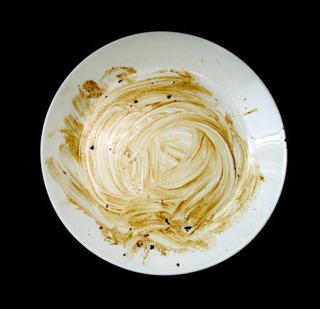 Dirty dishes on a black backgroundの写真素材