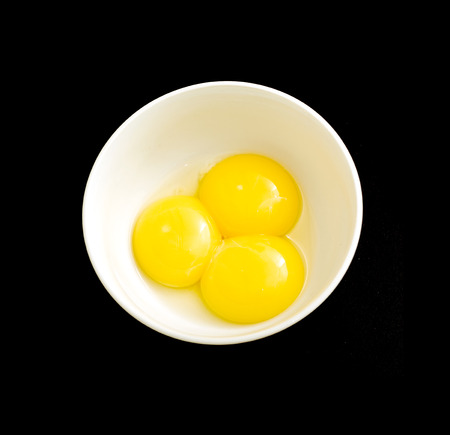 eggs without shell, egg yolksの写真素材