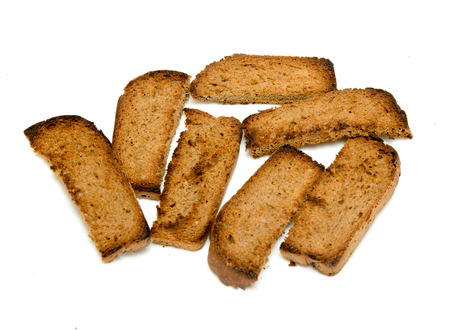 bread crumbs fried croutons isolated on whiteの写真素材