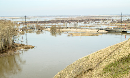 overflow dam on the river, spring floodの写真素材
