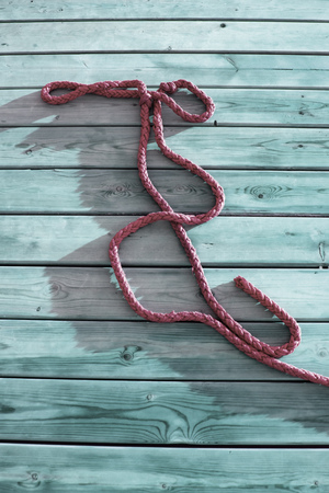 thick rope on a woodenの写真素材