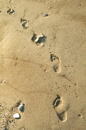 footprints in the sand, seascapeの写真素材