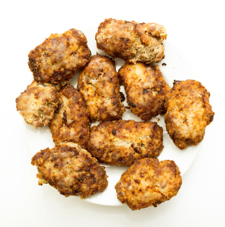 meatballs on a plate with a white backgroundの写真素材