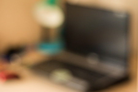 Blurred image of study room with computer.の写真素材